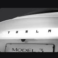 spigen-tesla-rear-emblem-logo-full-cover-tesla-model-3-2024-black-09.jpg